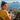 A round-the-world traveler checks a global eSIM above a coastal city with a harbor and mountains